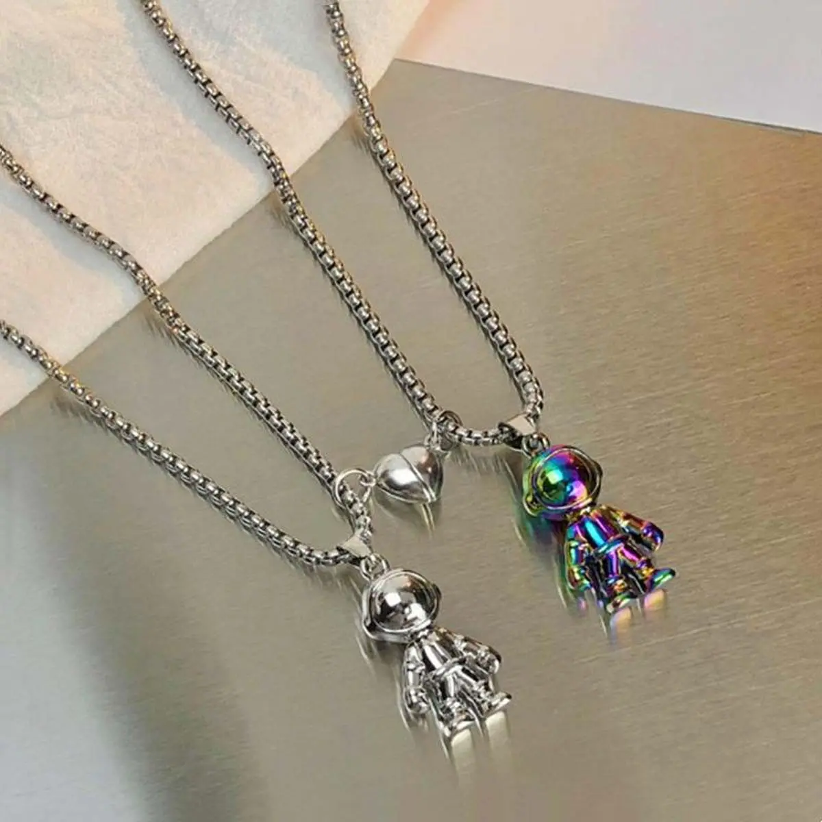 Necklace Stack for Couples, 2-Piece Matching Set with Astronaut Pendants and a Magnetic Heart on Link Chains, Valentine's Day Gift