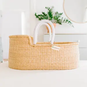 Signature Bilia  for Newborns - Natural Finish with White Leather Handles, Handmade, Safe for Sleep, Eco-Friendly, Includes Fitted Foam Pad, US Safety Tested, Sustainable Moses Basket Crafted from Natural Elephant Grass bedside