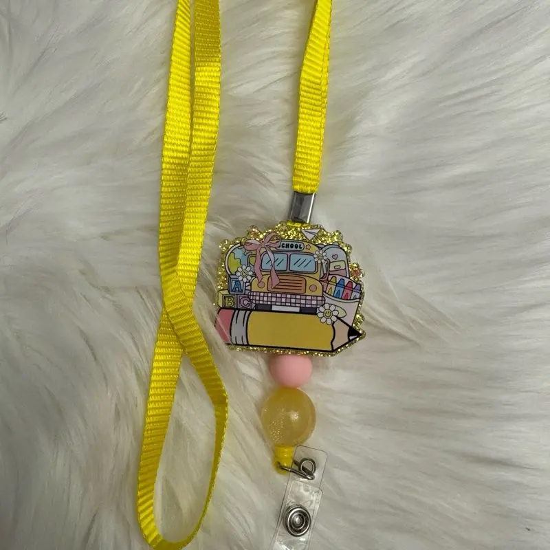 Bus Badge Reel Lanyard with Yellow Ribbon and Unique Bus Design Accessory