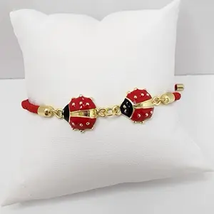14K Gold Laminated Adjustable Bracelet with Red Thread Ladybug Design Elegant Sophisticated Charm Jewelry