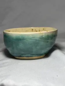 Speckled turquoise ceramic bowl