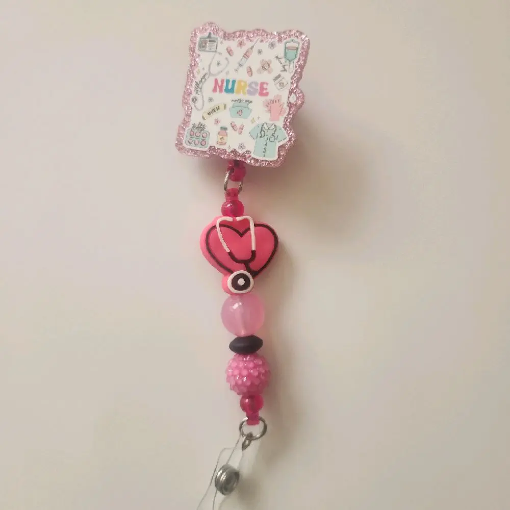 Pink Nurse with Stethoscope Badge Reel
