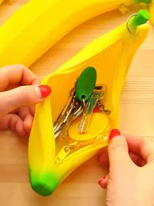 1PC Bright yellow banana-shaped silicone coin purse with green stem details, zipper closure, fun and practical, suitable for storing coins/small items.