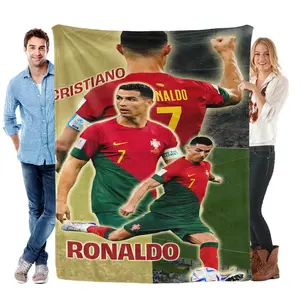 CR7 stans, assemble! Wrap yourself in this epic collage blanket featuring Cristiano Ronaldo in his iconic Portugal #7 kit—three dynamic action shots, stadium backdrop, and bold ‘RONALDO’ lettering. Ultra-soft flannel
