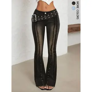 Women’s low-waist flared (bell-bottom) jeans with a large sun logo button detail and a perforated waistband; comfortable stretch denim; retro patched tassel wash; casual denim pants for everyday wear. GARMENTARY