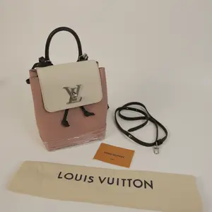 Pre-owned Louis Vuitton Backpack Pink & White Leather with Silver LV Logo, Adjustable Straps, Stylish & Functional Design