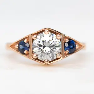 Cassia Ring with a 1.00 Carat Round Gray Moissanite and Blue Sapphire Accents in 10k Rose Gold - Ready to Size and Ship