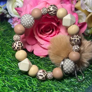 Naturally sassy wristlet keychain color scheme peanut butter, off nude, caramel, leopard print and  bling beads Made with wire