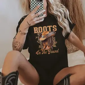 Women's Western Denim T-Shirt-Vintage soft polyester fabric with cowboy boots and hat pattern, eye-catching "down to earth" text-round neck casual style, suitable for country events, gym, outdoor sports, machine washable Western style top