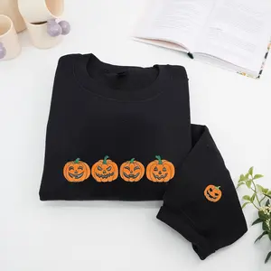 Pumpkin Faces Halloween Sweatshirt – Black Embroidered Jack-o’-Lantern Crewneck – Cozy Fall Aesthetic Shirt for Her, Teens, or Spooky Season Lovers