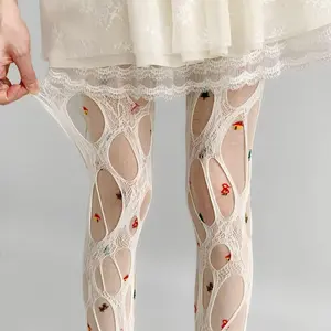 SleekHush Spring Summer Y2K Cutout Stockings for Women Vintage Hollow Out Fishnet Tights with Irregular Ripped Lace Streetwear Fashion