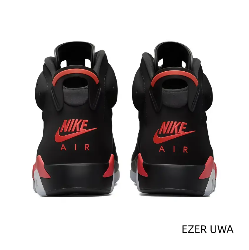 Striking red and black basketball sneakers. The black suede upper feels rich and soft. Vibrant red accents pop perfectly against the dark base. Great for pairing with black jeans or track pants. A timeless, aggressive style for the streets.