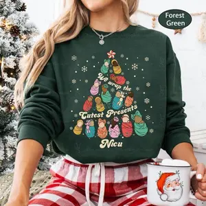 NICU Nurse Christmas Shirt, Neonatal Intensive Care Unit Nurse, We Wrap the Cutest Presents Shirt, NICU Nurse Swaddled Babies, Nurse Shirt Casual Classic Vintage Basics Street Unisex T-shirts Size S-5XL