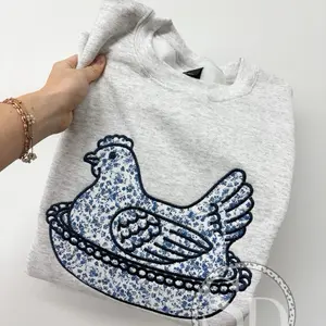 Blue floral hen on nest sweatshirt  Embroidered