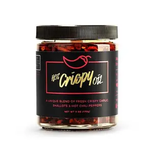 Hot Crispy Oil, An all natural unique blend of fresh fried shallots, fresh garlic and a proprietary blend of three different chili peppers. Highly addictive.