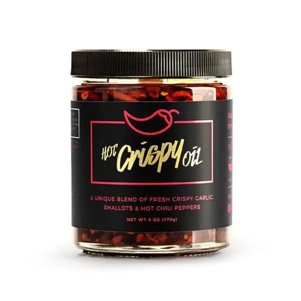 Hot Crispy Oil, An all natural unique blend of fresh fried shallots, fresh garlic and a proprietary blend of three different chili peppers. Highly addictive.