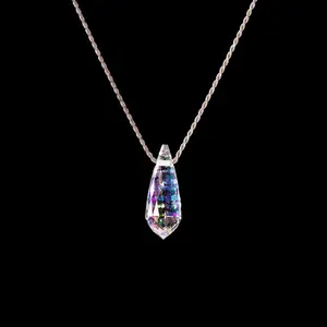 The Dorothy crystal pendant is made out of the finest dichroic glass that has been meticulously cut and polished. Each Dorothy