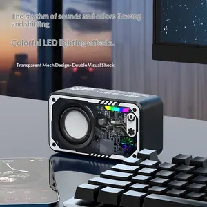 Hot Selling Bluetooth Mecha Small Steel Cannon Mini Transparent Bluetooth Small Speaker Portable Speaker Diaphragm With Colored Lights