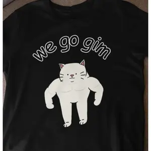 We Go Gim Buff Cat Meme Graphic Tee, 100% Cotton Oversized Comfort Outfit, Funny Gym Fitness Cute Fashion Shirt, Perfect Valentine's Day Gift For Him Her Family Friends