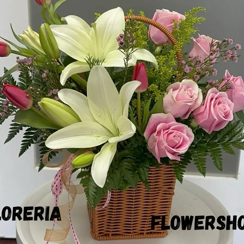 Morning Whispers - Elegant Basket Arrangement with White Lilies Pink Roses and Greenery for Special Occasions