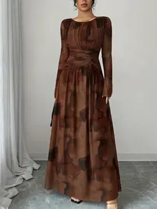 A women's brown fashionable ink wash pleated dress with pleated elements adding layers, long sleeved design for sun protection, suitable for commuting to work, shopping and outdoor activities, indoor and outdoor dressing