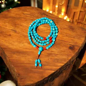 Sleeping beauty turquoise with natural sea coral and gold toping Bhuddist 108 Turquoise mala