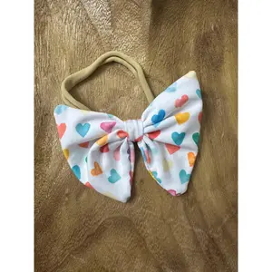 Colorful hearts white bow headband