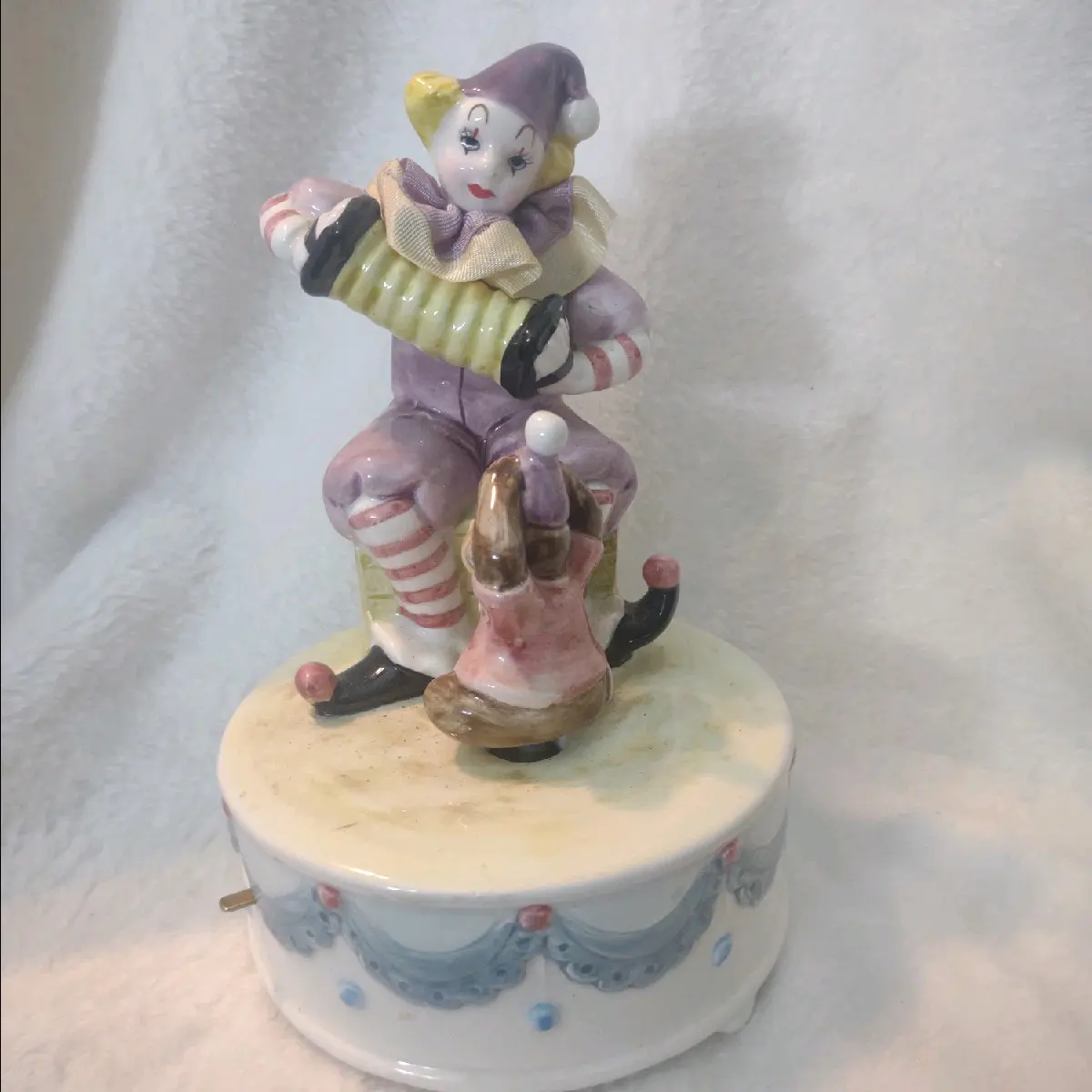 Vintage music box, Marked 1989 Geo Z. Lefton. Has on/off switch and plays “Whistle a Happy Tune”