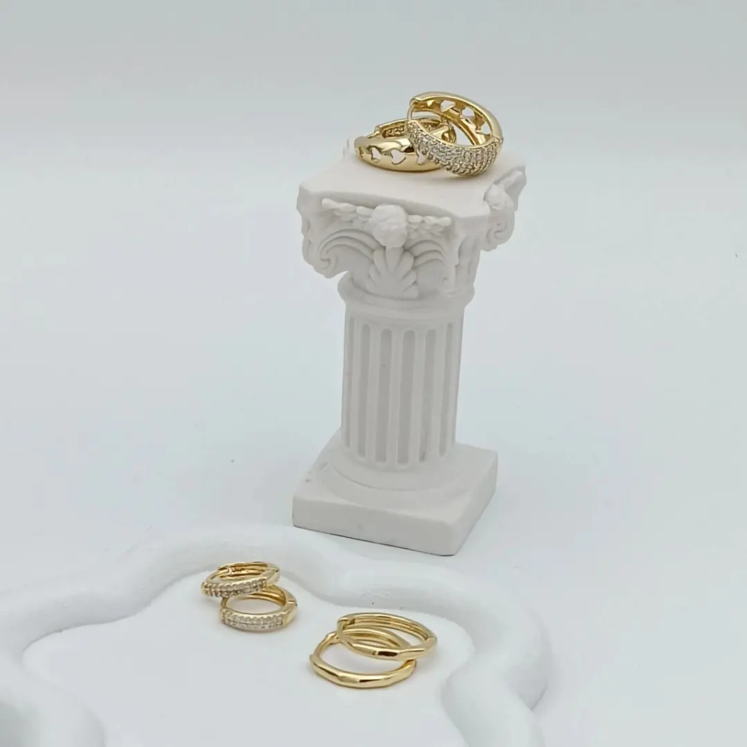 Small hoops in various styles. 14k gold plated, high quality