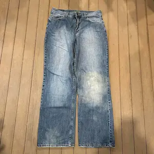 Y2k baggy skater denim jeans, street fashion, youthful and dynamic style, high quality denim material