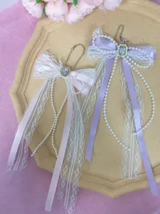 Cute lace bow—can be used as a bag charm, key chain, car ornament, or decorative accessory; it’s a gift suitable for a best friend.