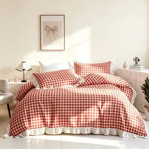 3-piece Nordic-style pink-orange gingham princess bedding set with ruffle details. Includes 1 duvet cover and 2 pillowcases (fillings not included). Made of soft fabric, equipped with easy-to-use zipper closure, suitable for all seasons.