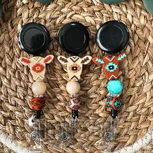 Aztec cow badge reel