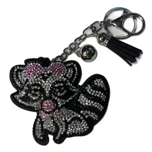 Bubblegum Raccoon Bag Charm or Keychain with Rhinestone Accents and Tassel Detail