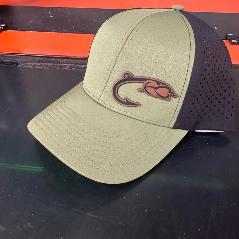Snap back waterproof hat with catfish hook leatherette patch
