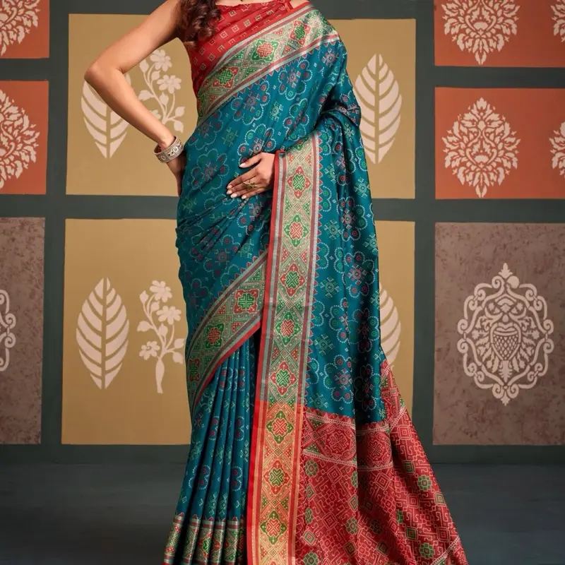 Patola silk saree Comes with a standard stitched blouse for a complete, ready-to-wear look.
