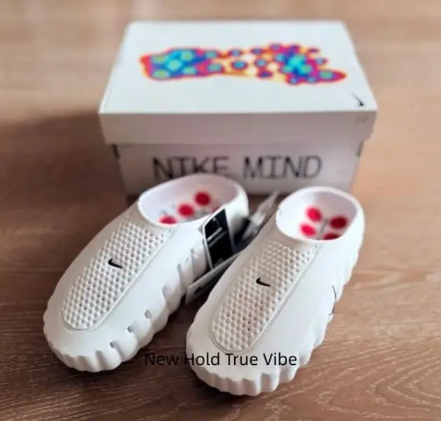 Classic all-white minimalist foam slides with pop red massage contrast accents, unique wavy ripple thick sole silhouette, timeless neutral tone matches all men’s streetwear & casual summer outfits