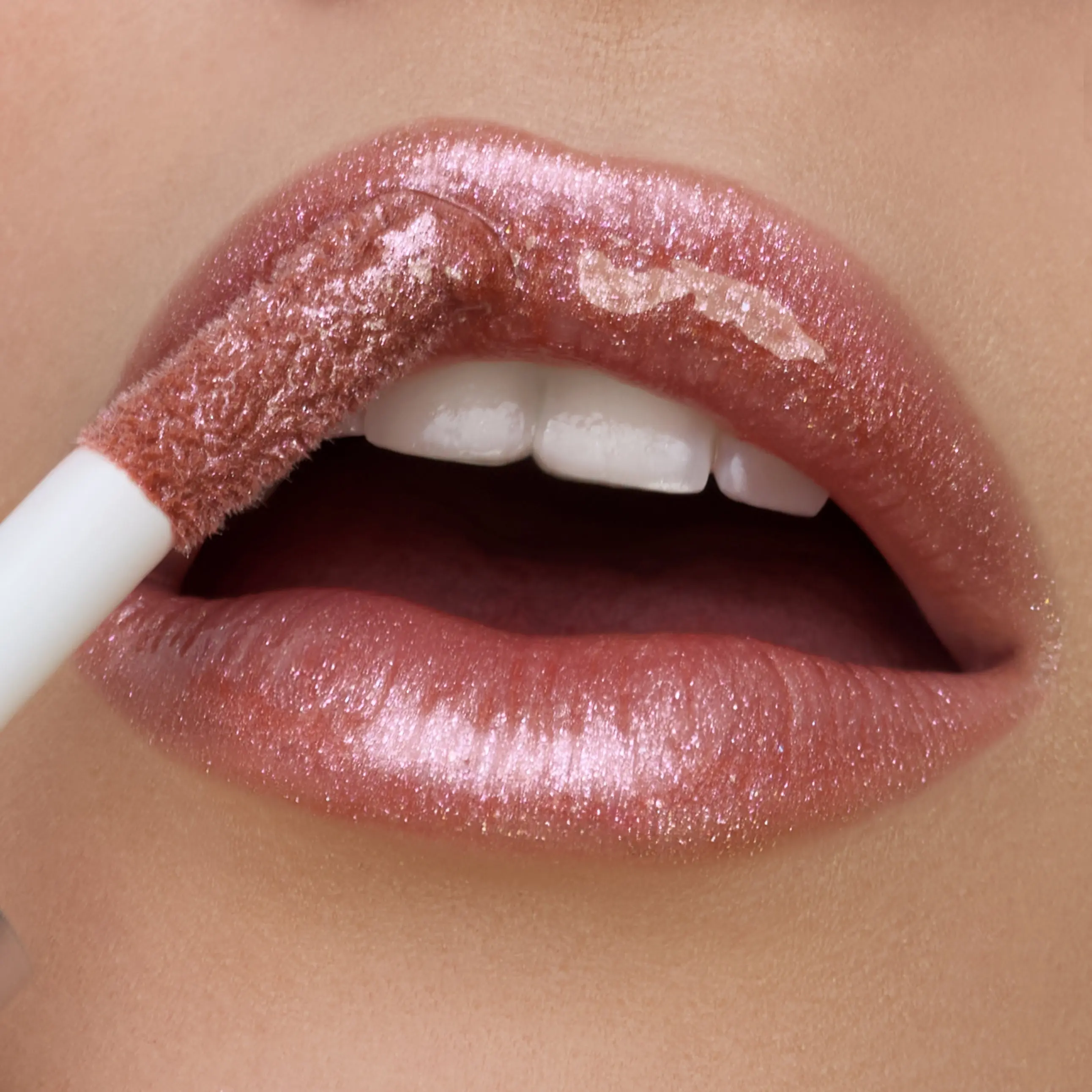 Center Stage | A Soft Sable Rose Lip Oil with Multifaceted Shimmer