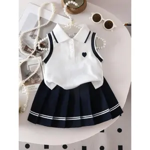 Girls' two-piece set, heart-shaped embroidered sleeveless top, pleated skirt with ribbon decoration, summer school style, cute and well-fitting