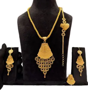 Elegant Gold Tone Jewelry Set with Intricate Design Necklace Earrings and Bracelet for Special Occasions