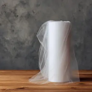 One roll, 12.6 inch/1969 inch extra-long semi-transparent white tulle, polyester fabric, cuttable mesh, suitable for weddings, parties, Halloween, Christmas, Valentine's Day decorations, wedding decorations, party decorations, and holiday decorations.