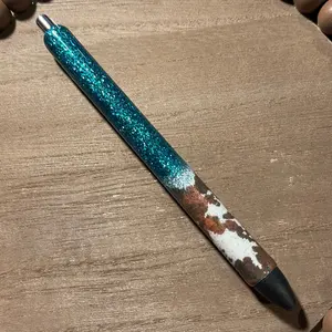 Turquoise glittered cow pen