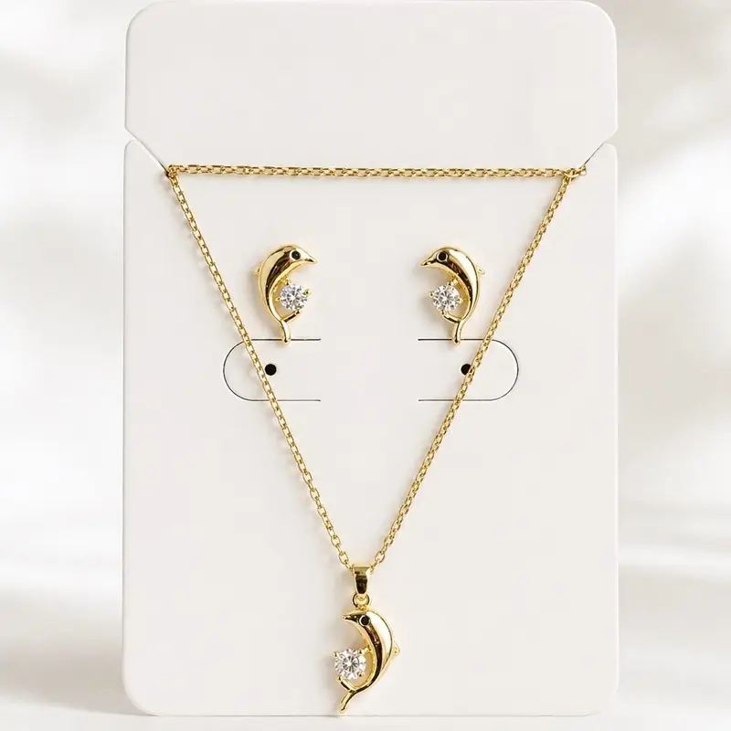 Hermoso Set de verano . Chapado en oro laminado 14k. Aretes y cadena delfín
