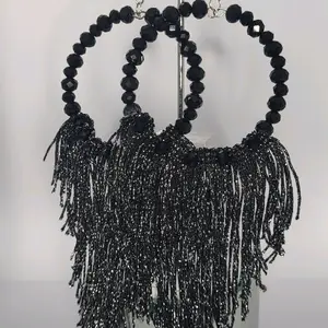 Black Sparkly Crystal Earrings or Tassel Earrings.