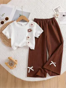 Sparklyn Young Girls 2pcs Set: White Textured Short Sleeve Top + Khaki Textured Wide Leg Pants With 3D Floral Bow Decor, Suitable For Casual, Holiday Wear In Summer Girl Brown Set Linen Set Kids Summer Sets