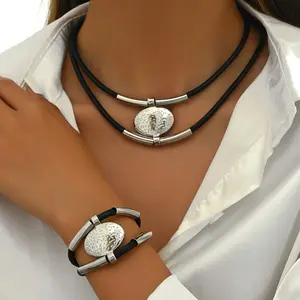 This Two-Piece Bohemian Style Women'S Jewelry Set Includes a Necklace And Bracelet with a Double-Layer Design, Featuring a Round Pendant with Engraved Creative Hammered Tube, Perfect As a Gift for Parties And Gatherings