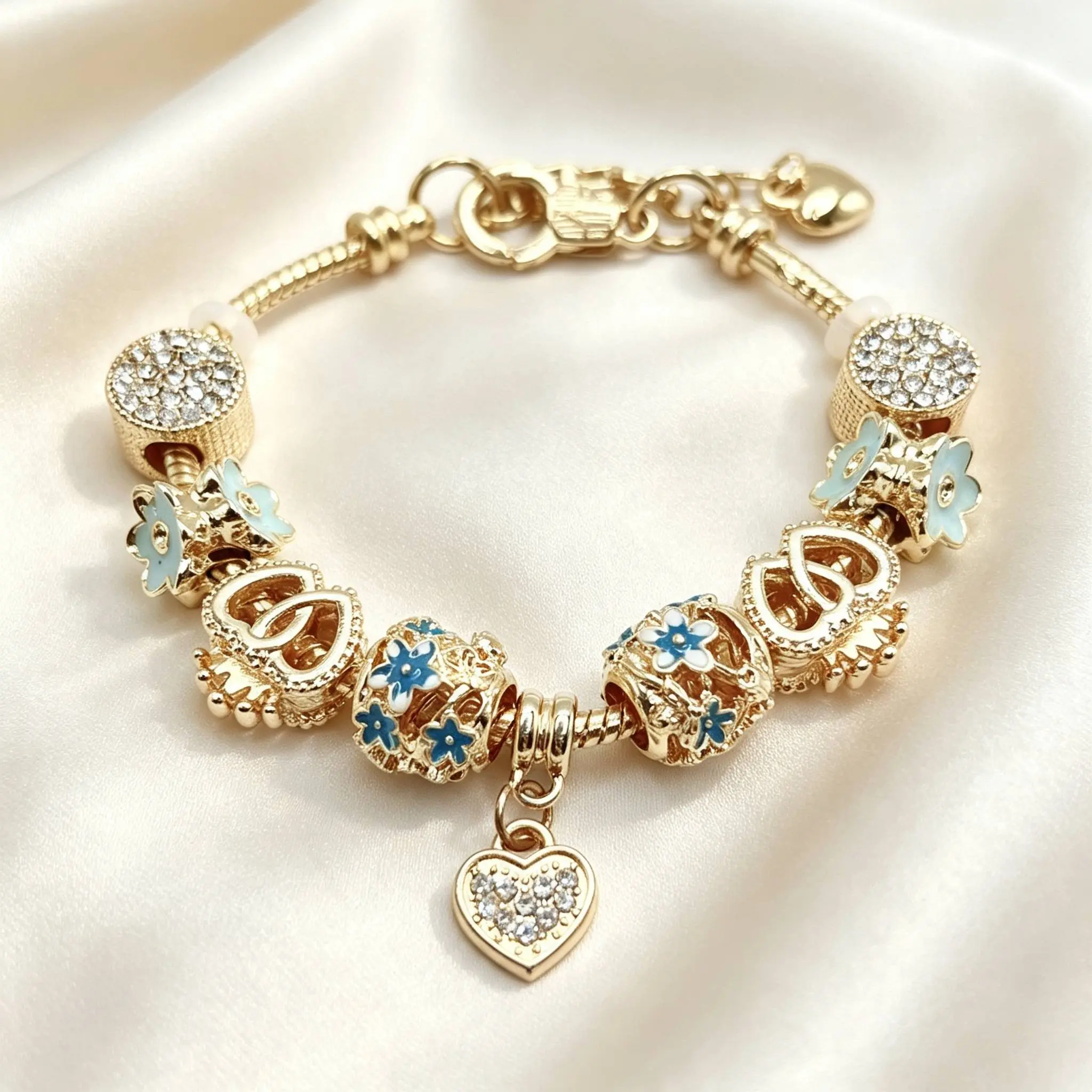 Elegant Gold Tone Heart Charm Bracelet with Floral Charms and Crystal Accents for Women