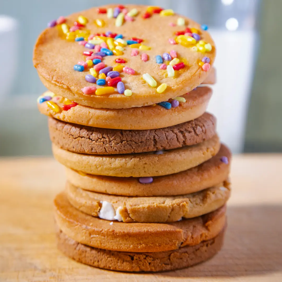 8 Cookies The Full Sweet set: Protein Double Chocolate, Chocolate Chip Chunk, Rainbow Sprinkle, and Matcha White Chip