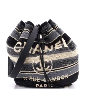 Pre-owned CHANEL material Bucket Bags Deauville Drawstring Bucket Bag Canvas with Striped Detail Medium by Rebag