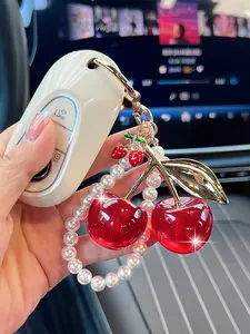 1pc  Europe and America's best-selling pearl chain glitter cherry fashion car keychain creative bag decoration pendant